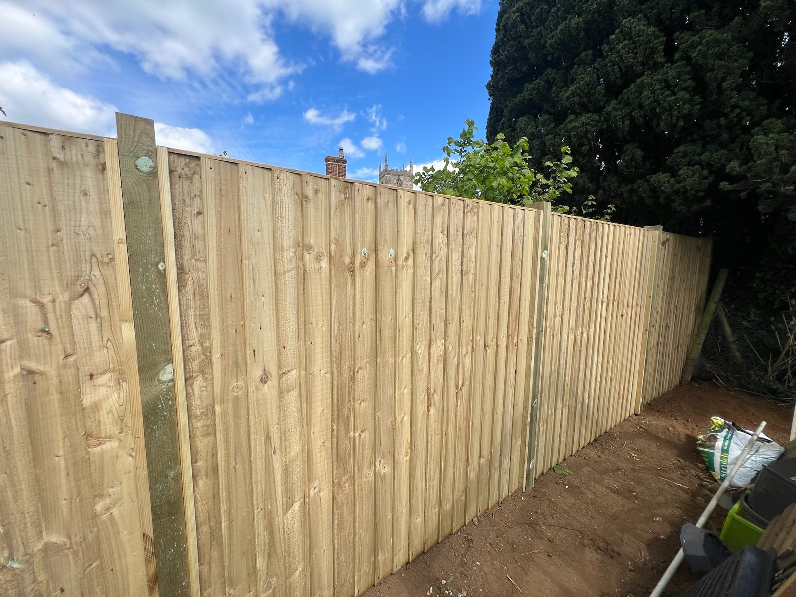 New featheredge fence panels installed